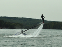 A guy with a water jet pack. It looks so easy.